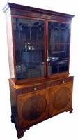 Lot 709 - George III mahogany bookcase on cupboard