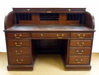 Lot 712 - Edwardian mahogany roll-top desk