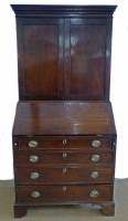Lot 741 - George III oak bookcase on bureau