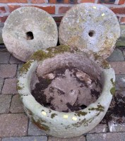 Lot 786 - Two grindstones, 42cm and 37cm diameter each and circular trough.