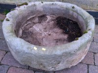 Lot 799 - Circular stone trough 65cm diameter and 25cm