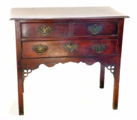 Lot 565 - George III walnut side table