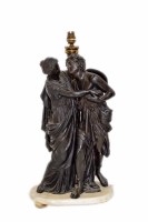 Lot 450 - Spelter lamp of two figures embracing.