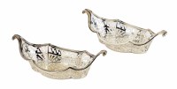Lot 182 - Pair of Edwardian pierced boat-shaped silver dishes