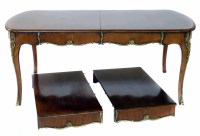 Lot 562 - Early 20th century walnut extending dining table