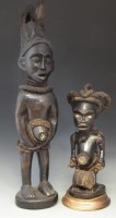Lot 7 - Two Congo fetish figures, the tallest measures