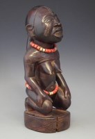 Lot 14 - Kongo kneeling female figure, 32cm high