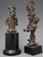 Lot 27 - Two Yoruba bronze female figures, the tallest