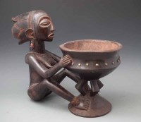 Lot 47 - Luba bowl carved with a female figure, 41cm high
