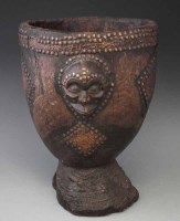 Lot 48 - Chokwe drum, carved with a mask and decorated