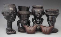 Lot 51 - Four anthropomorphic cups, also two palm wine