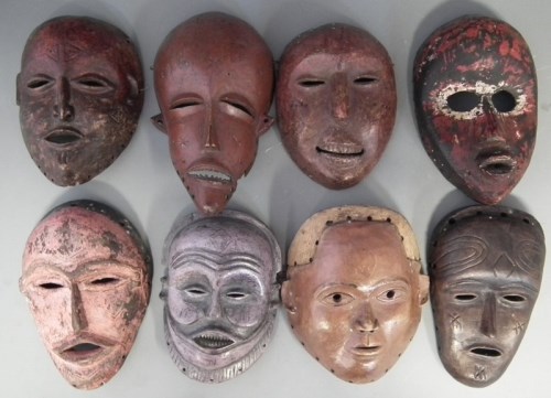 Lot 59 - Eight African masks carved in various tribal