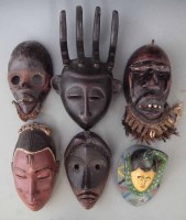 Lot 63 - Three Dan masks and three other Ivory Coast Guro