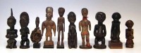 Lot 69 - Ten African figures carved in various tribal