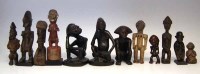 Lot 70 - Twelve African figures carved in various tribal