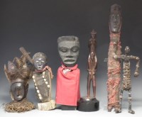 Lot 98 - Six African figures carved in various tribal