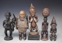 Lot 109 - Five African figures carved in Luba, Hemba