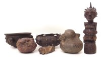Lot 111 - Songye figure and a collection of African terracottas to include two bowls, a model of a cricket and two other vessels