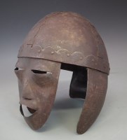 Lot 121 - Iron helmet, the bowl of four piece construction