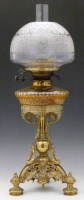 Lot 22 - Cast brass table oil lamp and shade