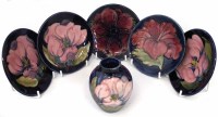 Lot 118 - Five small Moorcroft dishes and a vase.