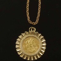Lot 180 - 1966 gold sovereign in sunburst mount with chain