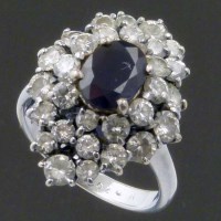Lot 212 - 750 white gold sapphire and diamond tiered