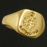 Lot 220 - 18ct gold signet ring with Medical Corps crest.