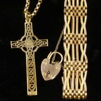 Lot 229 - 9ct gate bracelet; Celtic cross and chain