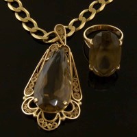 Lot 249 - Celtic design pendant set with smokey quartz on