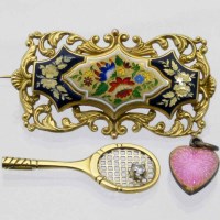 Lot 271 - 750 gold and diamond racquet; enamelled brooch