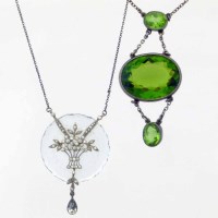 Lot 277 - Moldavite natural glass three-stone necklace; silver and paste necklace