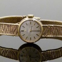 Lot 291 - Lady's Omega 9ct gold bracelet watch