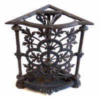 Lot 463 - Late Victorian Arts & Crafts design cast iron corner walking cane stand