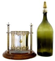 Lot 29 - Wine cradle in plated stand.