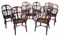 Lot 375 - A matched group of eight yew and elm late 19th century low-back Windsor chairs