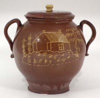 Lot 152 - Slipware jar and cover possibly West Cumberland initialled M.A. dated 1797