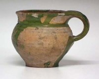 Lot 153 - Late Medieval earthernware jug   decorated with a