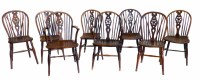 Lot 573 - A matched set of eight mid 19th century yew and elm dining chairs