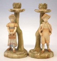 Lot 218 - Pair of Royal Worcester candlestick figures.