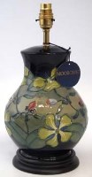 Lot 236 - Moorcroft lampbase and shade decorated with