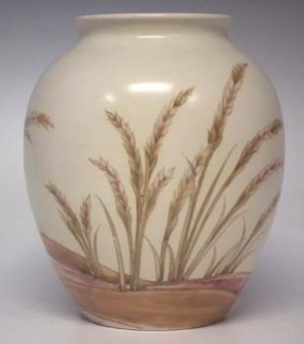 Lot 243 - Moorcroft vase decorated with waving corn.