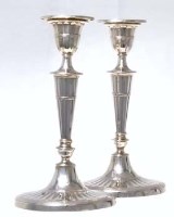Lot 319 - Pair fluted silver candlesticks London 1887.