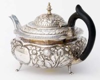 Lot 335 - Embossed silver teapot Sheffield 1894, H.Adkin.
