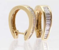 Lot 400 - Pair of 18ct gold and baguette diamond clip
