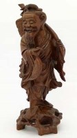 Lot 450 - Carved hardwood figure.