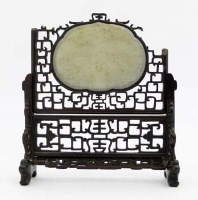 Lot 460 - Chinese mutton fat jade table screen in hardwood frame.
