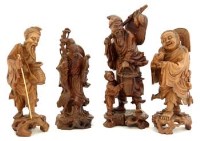 Lot 483 - Four Chinese carved hardwood figures