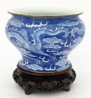 Lot 493 - Chinese vase painted with dragons on wood base.