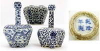 Lot 505 - Two Chinese blue and white tulip vases and another without a neck.